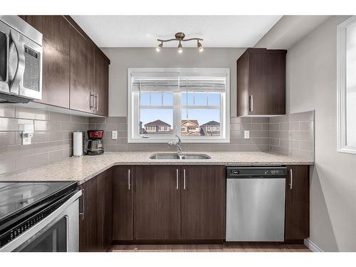 25 Cityscape Court Ne, Calgary, AB - Indoor Photo Showing Kitchen With Double Sink
