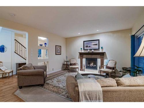 197 Magenta Crescent, Chestermere, AB - Indoor Photo Showing Living Room With Fireplace