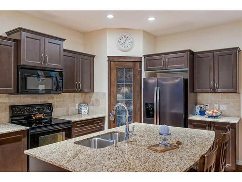 197 Magenta Crescent, Chestermere, AB - Indoor Photo Showing Kitchen With Double Sink