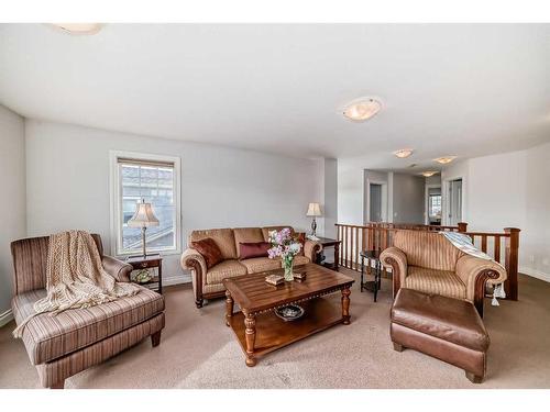 2513 Coopers Circle Sw, Airdrie, AB - Indoor Photo Showing Living Room