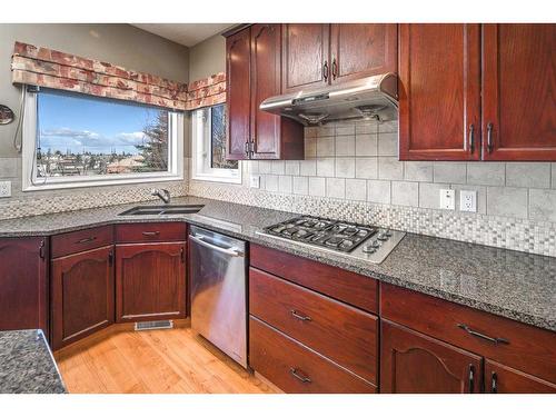 32 Hawkmount Heights Nw, Calgary, AB - Indoor Photo Showing Kitchen With Double Sink