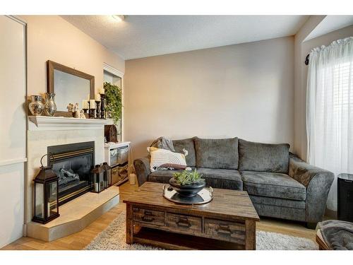 2404 Broadview Road Nw, Calgary, AB - Indoor Photo Showing Living Room With Fireplace