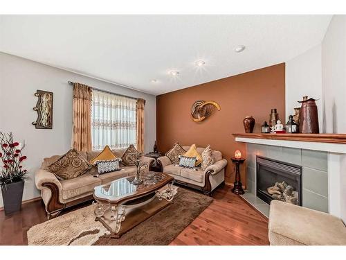 186 Everglen Crescent Sw, Calgary, AB - Indoor Photo Showing Living Room With Fireplace