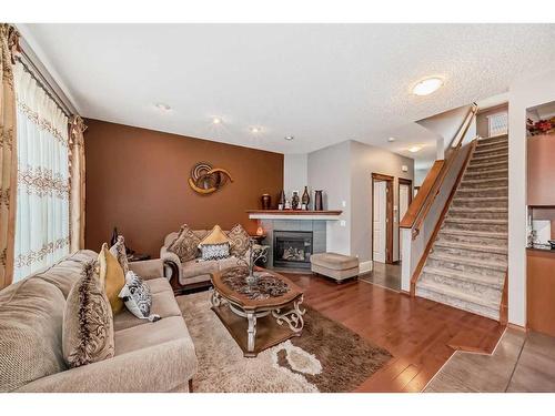 186 Everglen Crescent Sw, Calgary, AB - Indoor Photo Showing Living Room With Fireplace
