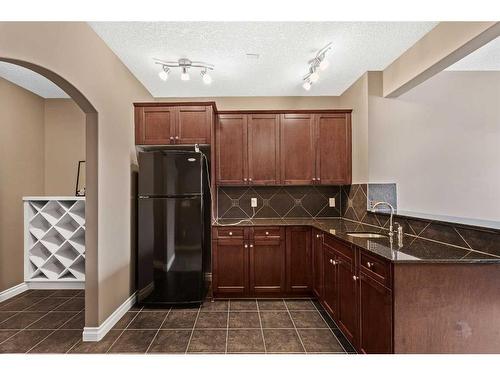 9058 14 Avenue Sw, Calgary, AB - Indoor Photo Showing Kitchen With Double Sink