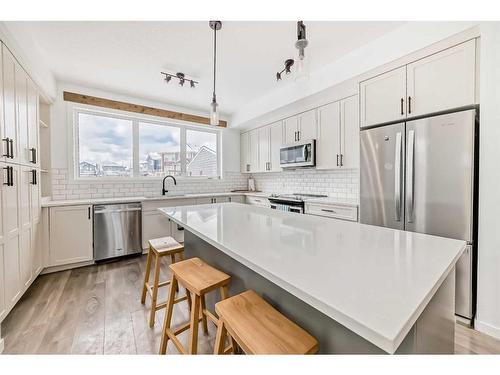 926 Mahogany Boulevard Se, Calgary, AB - Indoor Photo Showing Kitchen With Upgraded Kitchen