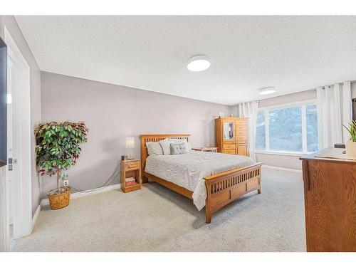 11 Chapala Terrace Se, Calgary, AB - Indoor Photo Showing Bedroom
