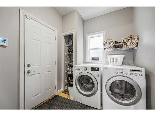 11 Chapala Terrace Se, Calgary, AB - Indoor Photo Showing Laundry Room