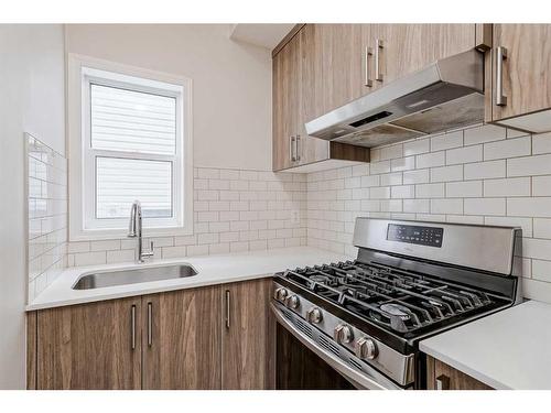 227 Savanna Way Ne, Calgary, AB - Indoor Photo Showing Kitchen With Upgraded Kitchen