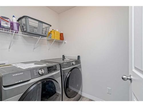 227 Savanna Way Ne, Calgary, AB - Indoor Photo Showing Laundry Room