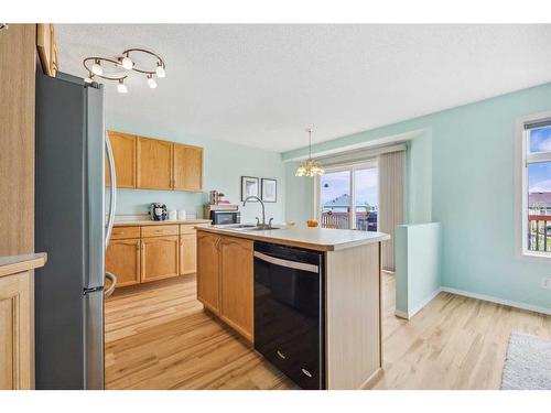 128 Country Hills Way Nw, Calgary, AB - Indoor Photo Showing Kitchen With Double Sink