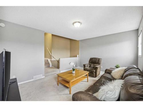 128 Country Hills Way Nw, Calgary, AB - Indoor Photo Showing Living Room