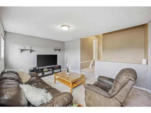 128 Country Hills Way Nw, Calgary, AB - Indoor Photo Showing Living Room