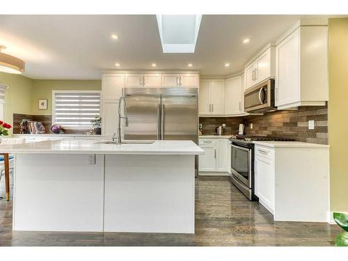 47 Haddock Road Sw, Calgary, AB - Indoor Photo Showing Kitchen With Upgraded Kitchen
