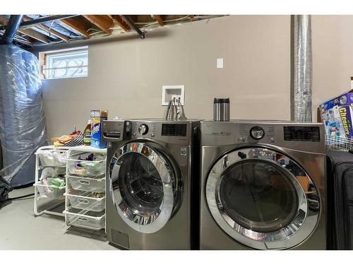 47 Haddock Road Sw, Calgary, AB - Indoor Photo Showing Laundry Room