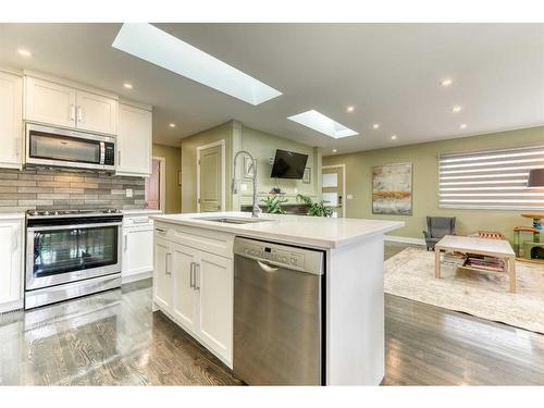 47 Haddock Road Sw, Calgary, AB - Indoor Photo Showing Kitchen With Upgraded Kitchen
