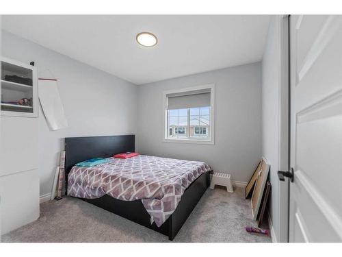 932 Bayview Rise Sw, Airdrie, AB - Indoor Photo Showing Bedroom