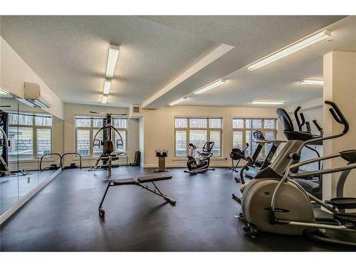 104-15 Aspenmont Heights Sw, Calgary, AB - Indoor Photo Showing Gym Room