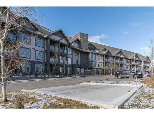 104-15 Aspenmont Heights Sw, Calgary, AB - Outdoor With Balcony With Facade