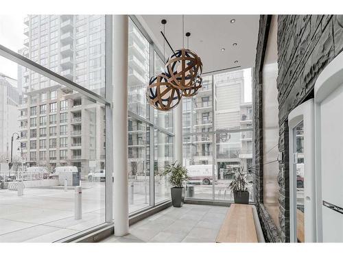 403-138 Waterfront Court Sw, Calgary, AB - Indoor Photo Showing Other Room