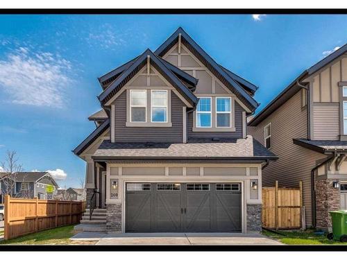 260 Paint Horse Drive, Cochrane, AB - Outdoor With Facade