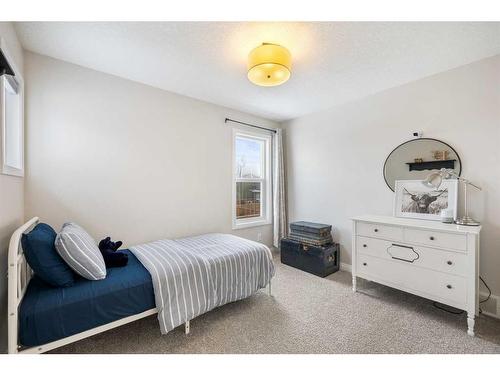260 Paint Horse Drive, Cochrane, AB - Indoor Photo Showing Bedroom