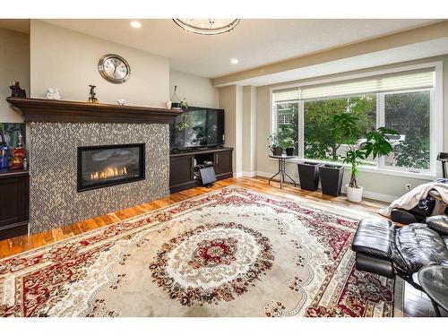 2116 15 Street Sw, Calgary, AB - Indoor Photo Showing Living Room With Fireplace