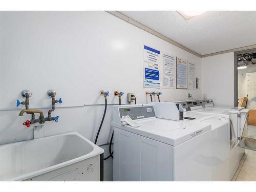 236-1421 7 Avenue Nw, Calgary, AB - Indoor Photo Showing Laundry Room