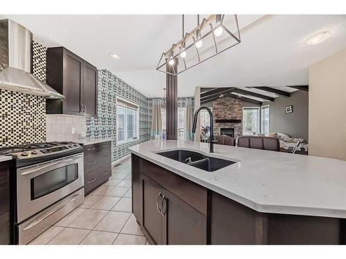 121 Magenta Crescent, Chestermere, AB - Indoor Photo Showing Kitchen With Double Sink