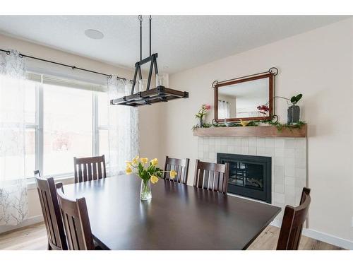 164 Royal Oak Terrace Nw, Calgary, AB - Indoor Photo Showing Dining Room With Fireplace