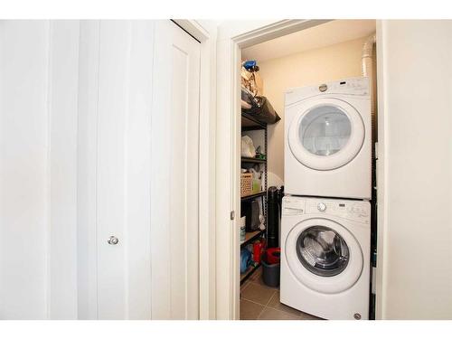 2305-522 Cranford Drive Se, Calgary, AB - Indoor Photo Showing Laundry Room