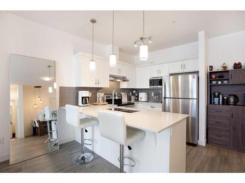 2305-522 Cranford Drive Se, Calgary, AB - Indoor Photo Showing Kitchen With Stainless Steel Kitchen With Upgraded Kitchen