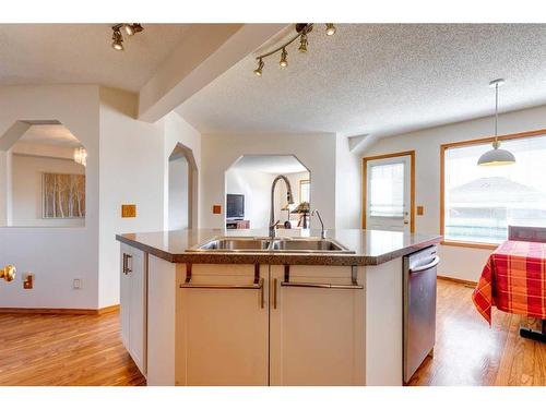 24 Somerset Park Sw, Calgary, AB - Indoor Photo Showing Kitchen With Double Sink