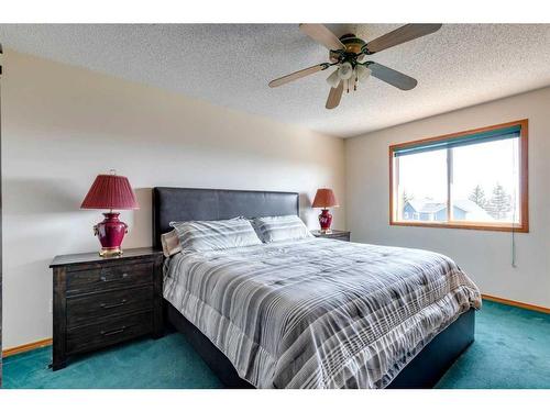 24 Somerset Park Sw, Calgary, AB - Indoor Photo Showing Bedroom
