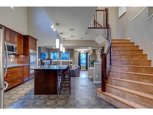20 New Brighton Court Se, Calgary, AB - Indoor Photo Showing Kitchen With Upgraded Kitchen