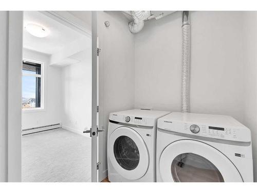 406-40 Sage Hill Walk Nw, Calgary, AB - Indoor Photo Showing Laundry Room