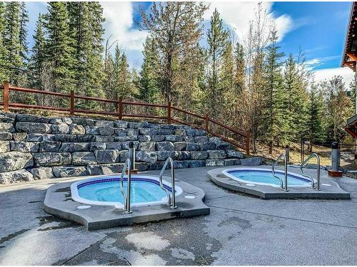 410-170 Kananaskis Way, Canmore, AB - Outdoor With In Ground Pool