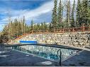 410-170 Kananaskis Way, Canmore, AB  - Outdoor With In Ground Pool 