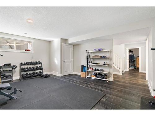 138 Auburn Sound View Se, Calgary, AB - Indoor Photo Showing Gym Room
