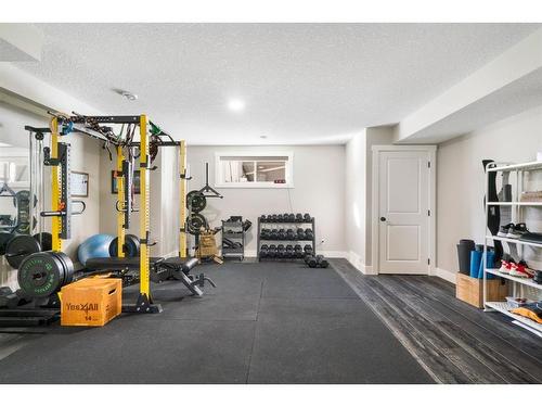 138 Auburn Sound View Se, Calgary, AB - Indoor Photo Showing Gym Room