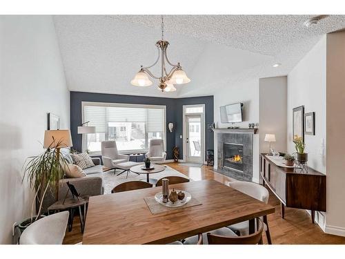 211 Sunset Square, Cochrane, AB - Indoor With Fireplace