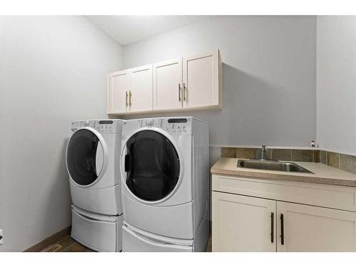 16 Westpark Court Sw, Calgary, AB - Indoor Photo Showing Laundry Room
