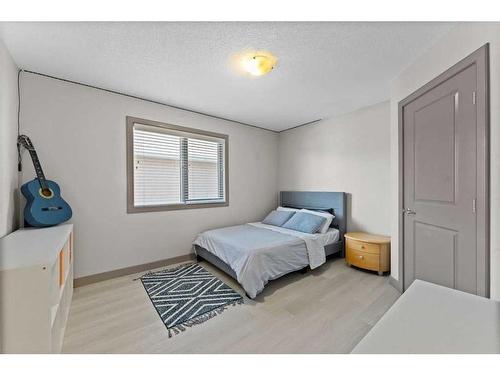16 Westpark Court Sw, Calgary, AB - Indoor Photo Showing Bedroom