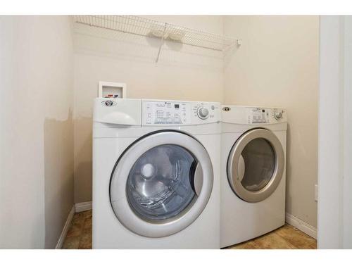 419 Everridge Drive Sw, Calgary, AB - Indoor Photo Showing Laundry Room