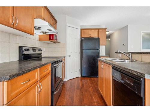 419 Everridge Drive Sw, Calgary, AB - Indoor Photo Showing Kitchen With Double Sink