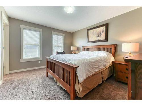 209 Rainbow Falls Manor, Chestermere, AB - Indoor Photo Showing Bedroom