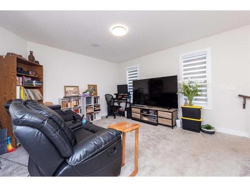 124 Emberside Place, Cochrane, AB - Indoor Photo Showing Living Room
