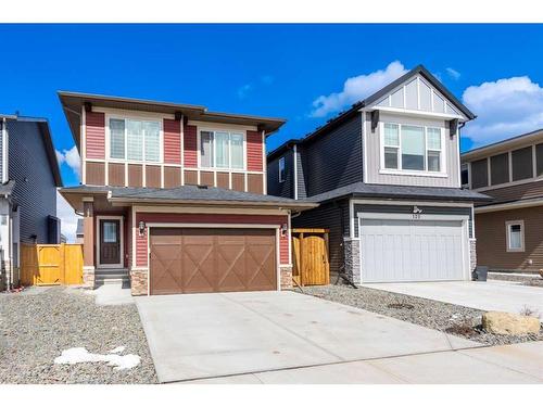 124 Emberside Place, Cochrane, AB - Outdoor With Facade