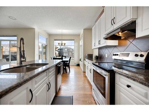 1260 Everridge Drive Sw, Calgary, AB - Indoor Photo Showing Kitchen With Double Sink