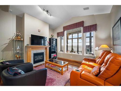 29 Panorama Hills Heights Nw, Calgary, AB - Indoor Photo Showing Living Room With Fireplace